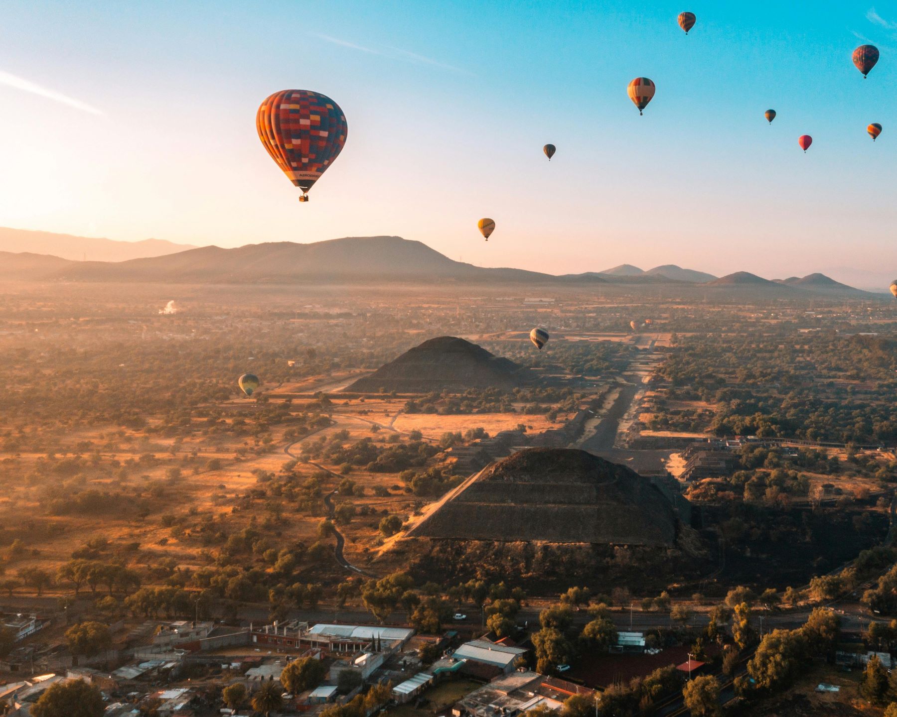 Hot air balloons flying over Teotihuacán